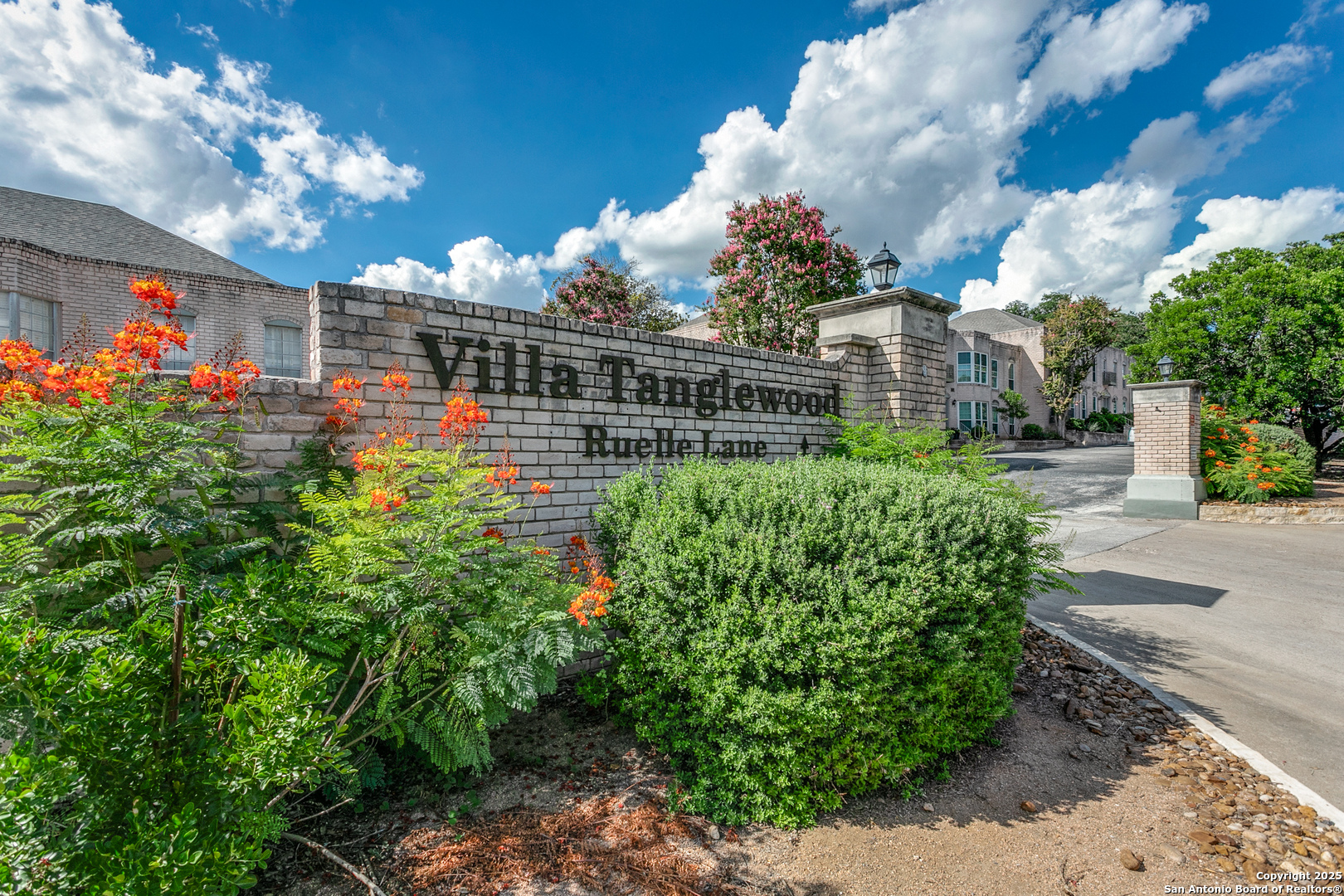 109 Ruelle Lane, Unit 109A San Antonio, TX 78209 - Photo 2 of 23 a picture of flowers in front of house