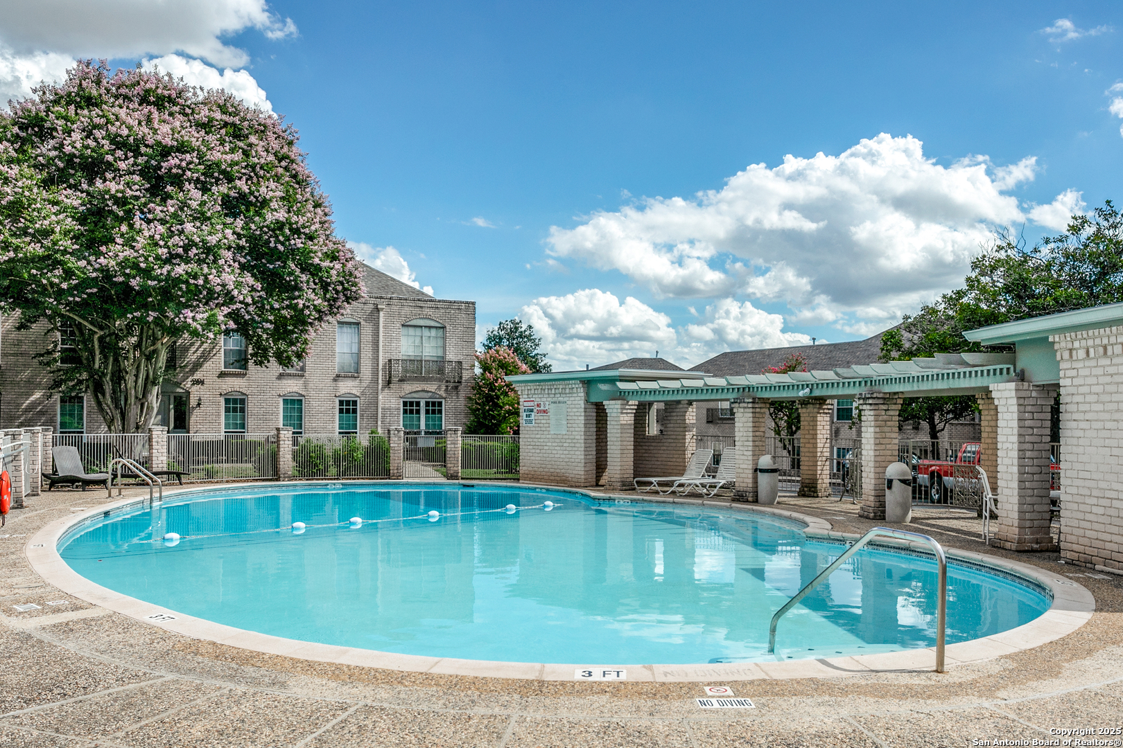 109 Ruelle Lane, Unit 109A San Antonio, TX 78209 - Photo 23 of 23 a view of a house with swimming pool and sitting area