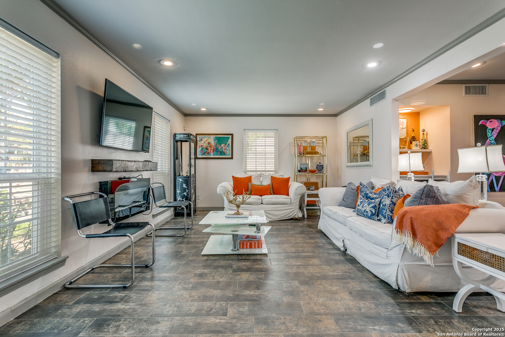 109 Ruelle Lane, Unit 109A San Antonio, TX 78209 - Photo 5 of 23 a living room with furniture and a flat screen tv