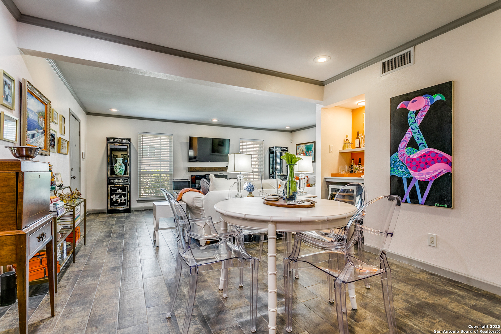 109 Ruelle Lane, Unit 109A San Antonio, TX 78209 - Photo 8 of 23 a view of a dining room with furniture and wooden floor