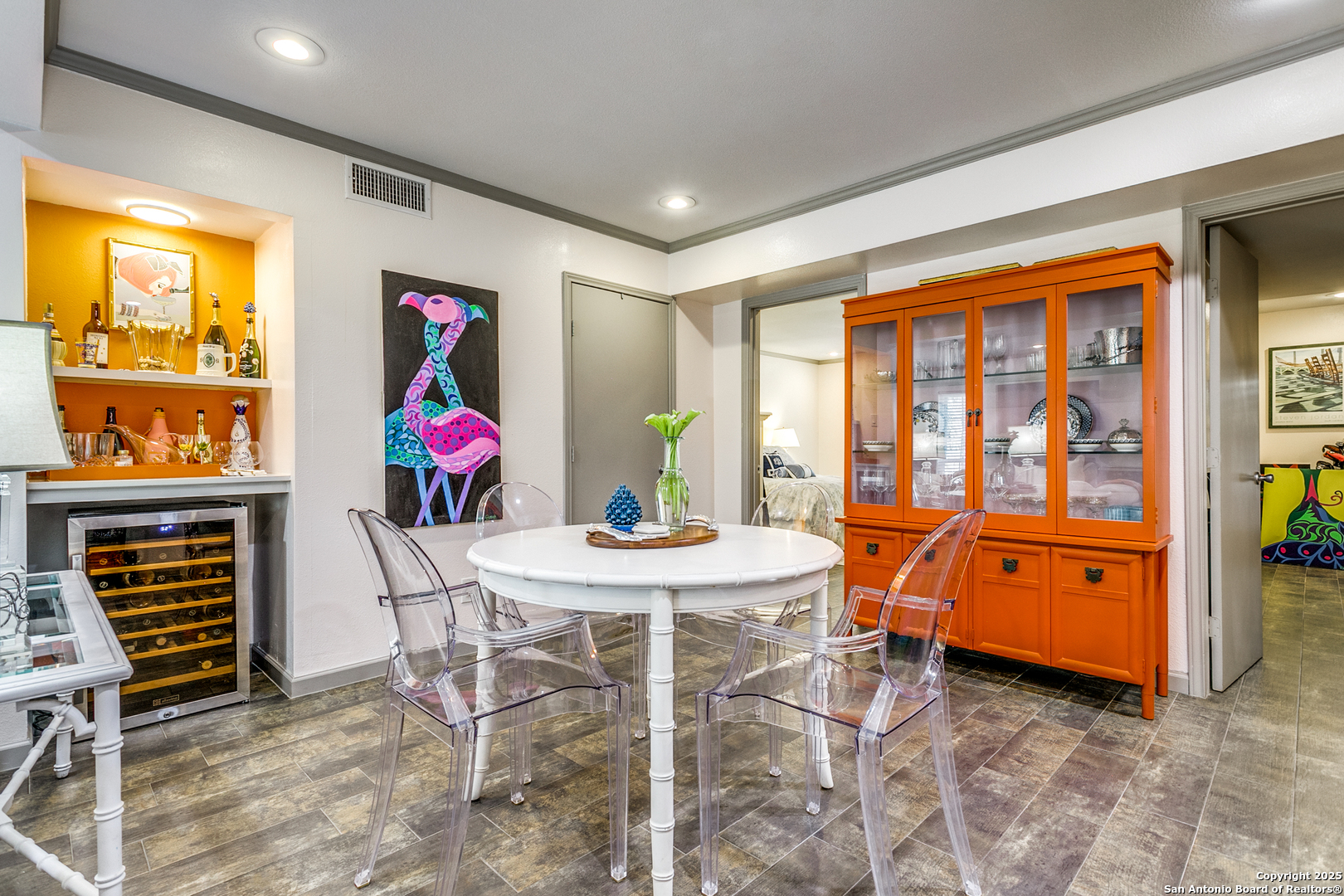 109 Ruelle Lane, Unit 109A San Antonio, TX 78209 - Photo 9 of 23 a view of a dining room with furniture window and outside view