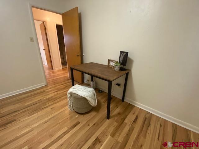 243 North Madison Street Cortez, CO 81321 - Photo 18 of 29 a bathroom with a sink and a mirror