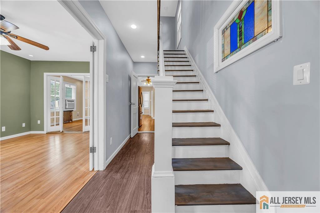 27 Charles Street Carteret, NJ 07008 - Photo 19 of 40 a view of entryway with wooden floor