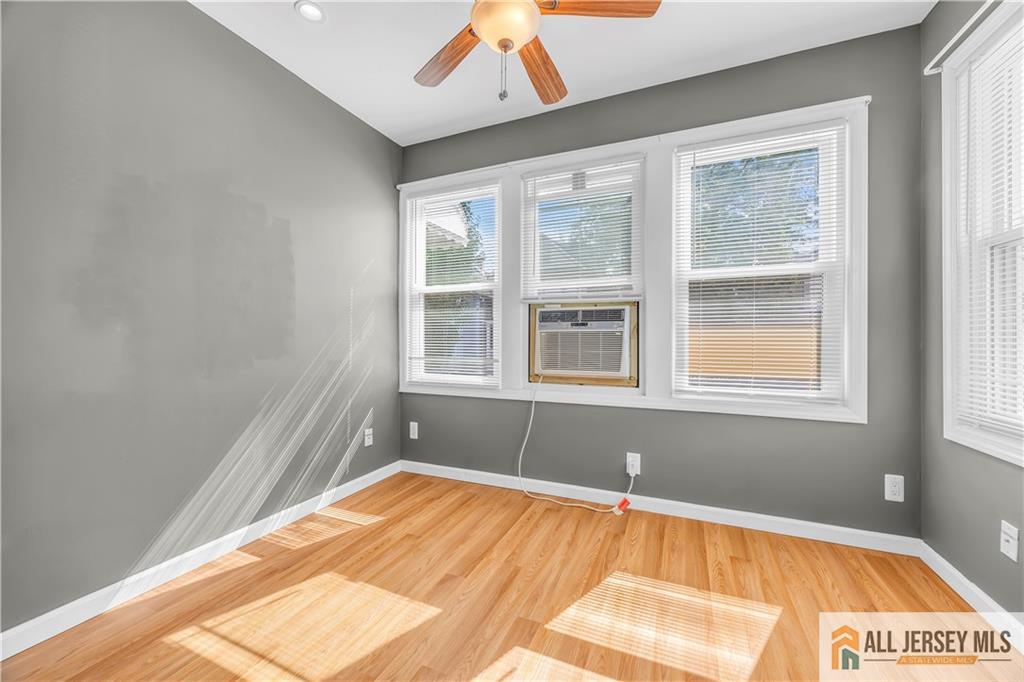 27 Charles Street Carteret, NJ 07008 - Photo 3 of 40 a view of an empty room with a window