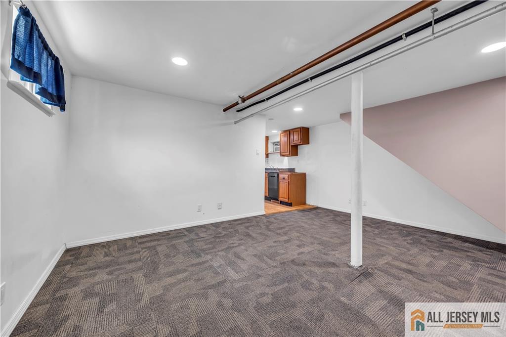 27 Charles Street Carteret, NJ 07008 - Photo 32 of 40 a view of an empty room