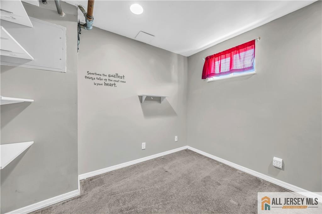 27 Charles Street Carteret, NJ 07008 - Photo 37 of 40 a view of a room with window