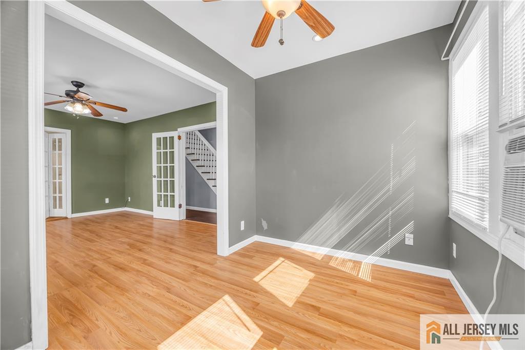27 Charles Street Carteret, NJ 07008 - Photo 5 of 40 a view of a room with a bed and a window