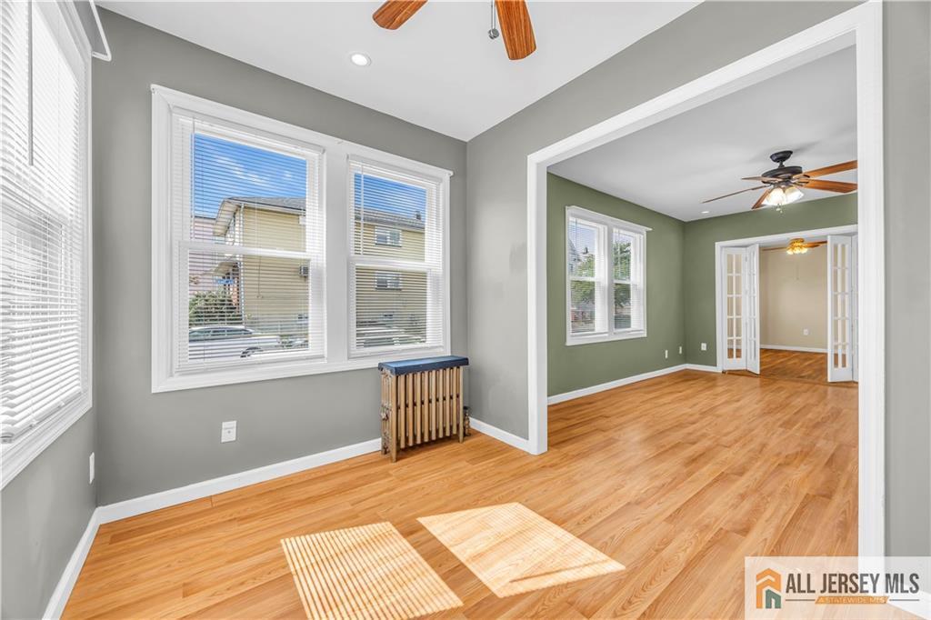 27 Charles Street Carteret, NJ 07008 - Photo 8 of 40 a bedroom with a bed and a window