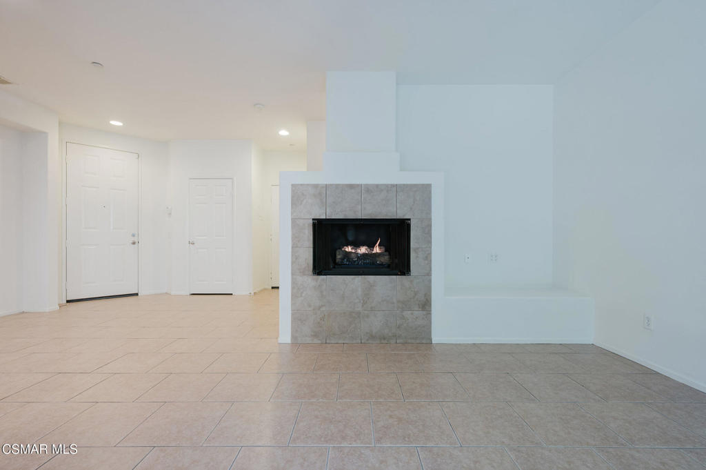 1454 Patricia Avenue, Unit 402 Simi Valley, CA 93065 - Photo 13 of 50 a view of an empty room with a fireplace