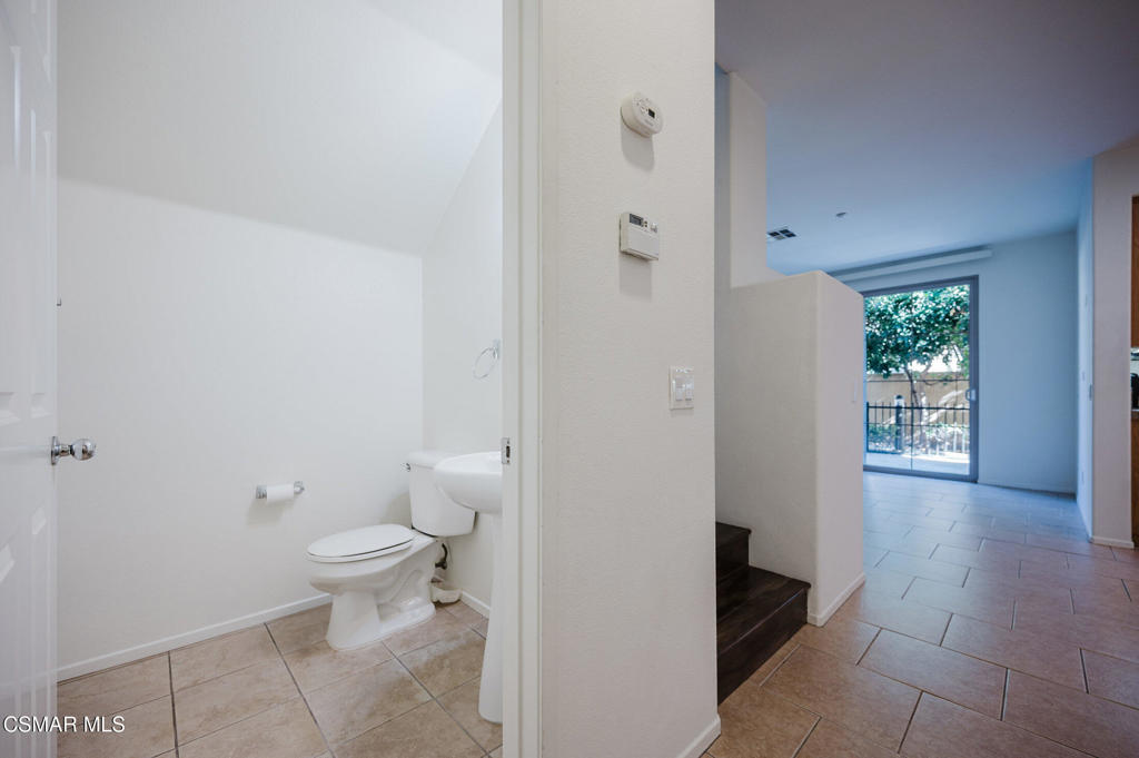 1454 Patricia Avenue, Unit 402 Simi Valley, CA 93065 - Photo 16 of 50 a bathroom with a toilet