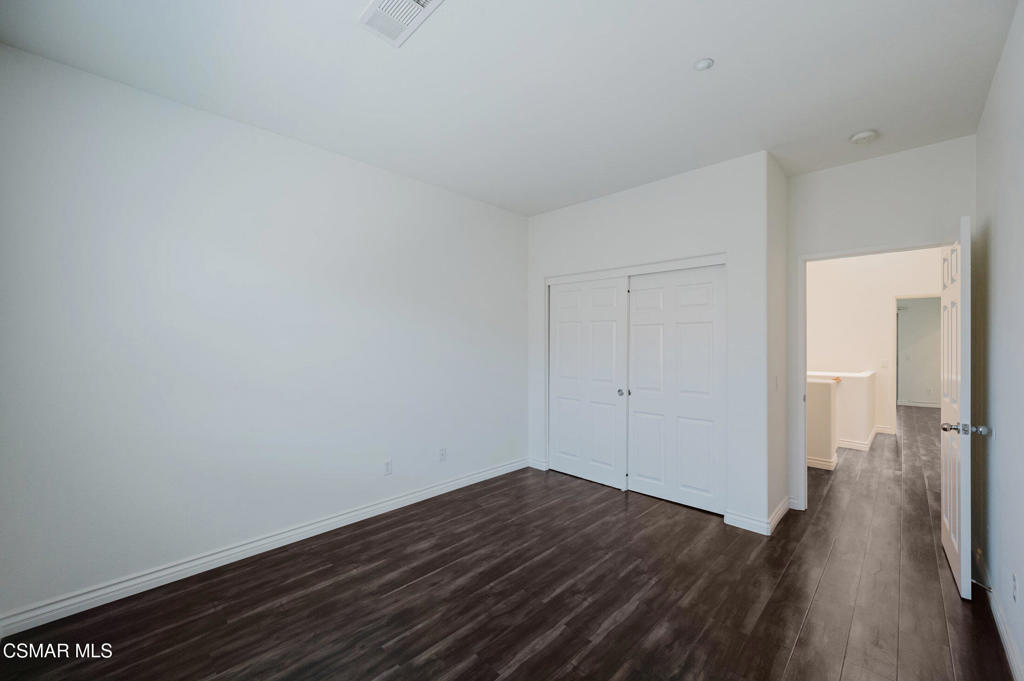 1454 Patricia Avenue, Unit 402 Simi Valley, CA 93065 - Photo 41 of 50 a view of a room with wooden floor