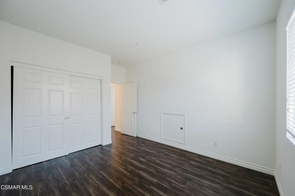 1454 Patricia Avenue, Unit 402 Simi Valley, CA 93065 - Photo 42 of 50 a view of room with wooden floor