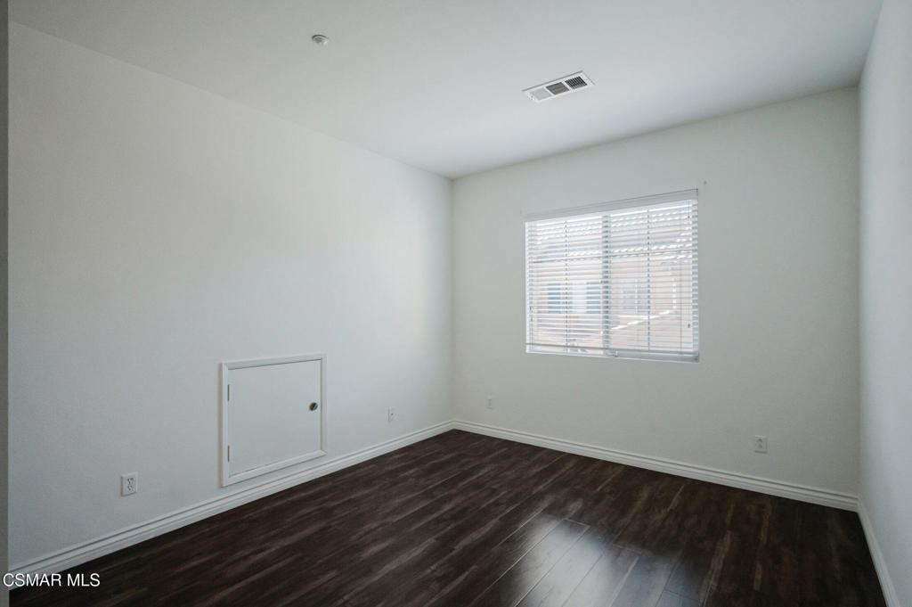 1454 Patricia Avenue, Unit 402 Simi Valley, CA 93065 - Photo 43 of 50 wooden floor in an empty room