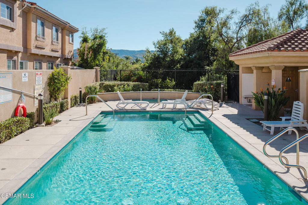 1454 Patricia Avenue, Unit 402 Simi Valley, CA 93065 - Photo 50 of 50 a view of a house with backyard sitting area and swimming pool