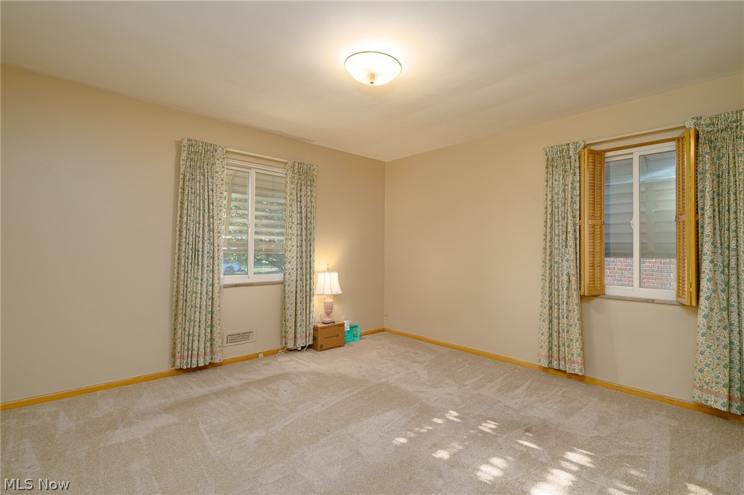 6572 South Canterbury Road Cleveland, OH 44129 - Photo 15 of 36 Spacious bedroom has vinyl windows