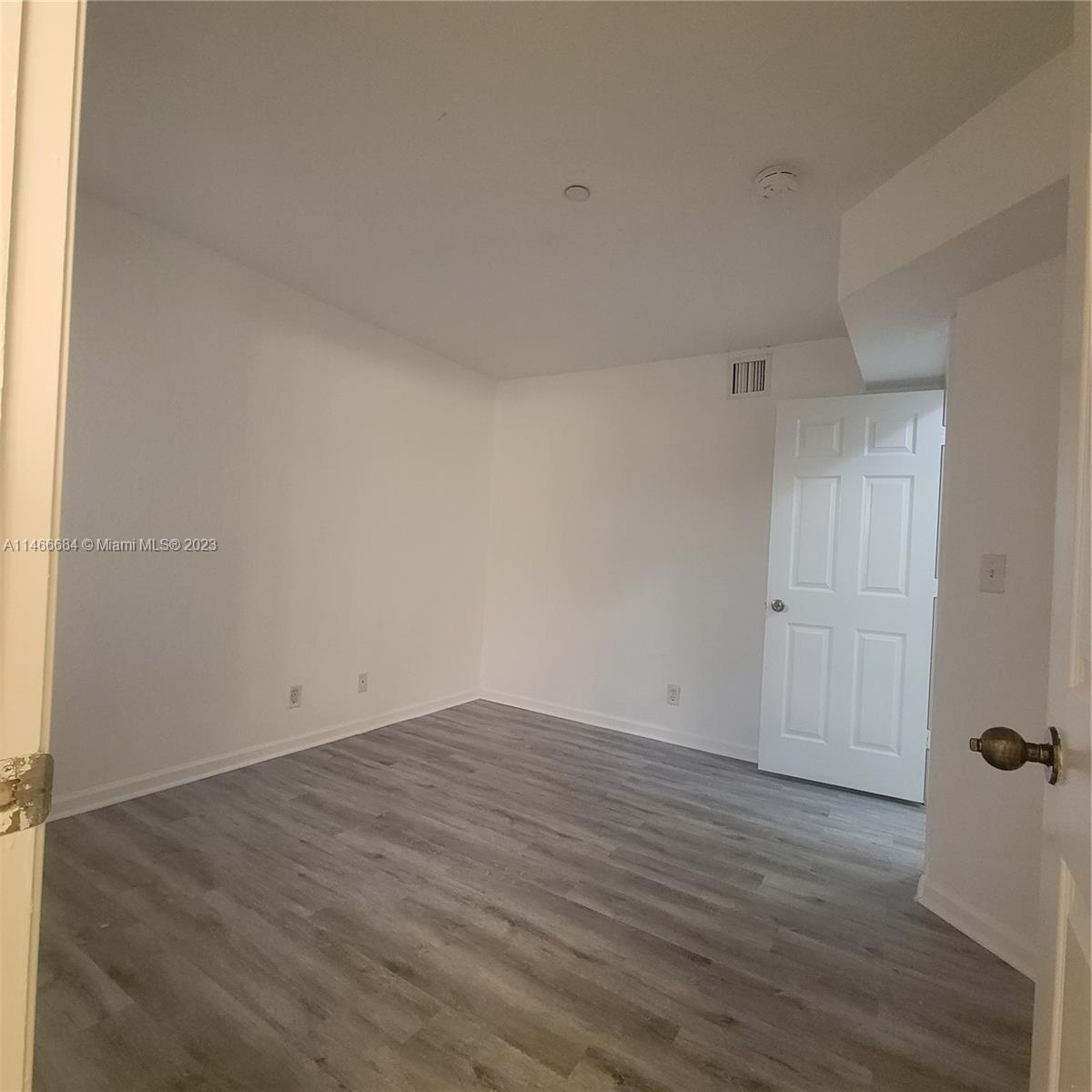 3883 Tree Top Drive Weston, FL 33332 - Photo 16 of 22 wooden floor in a room