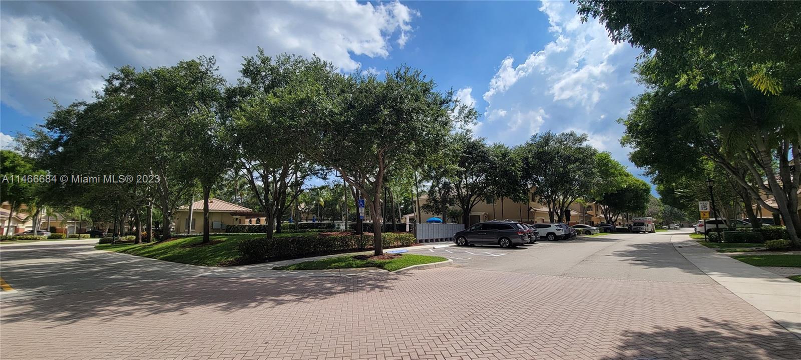 3883 Tree Top Drive Weston, FL 33332 - Photo 22 of 22 a car parked on the side of the road