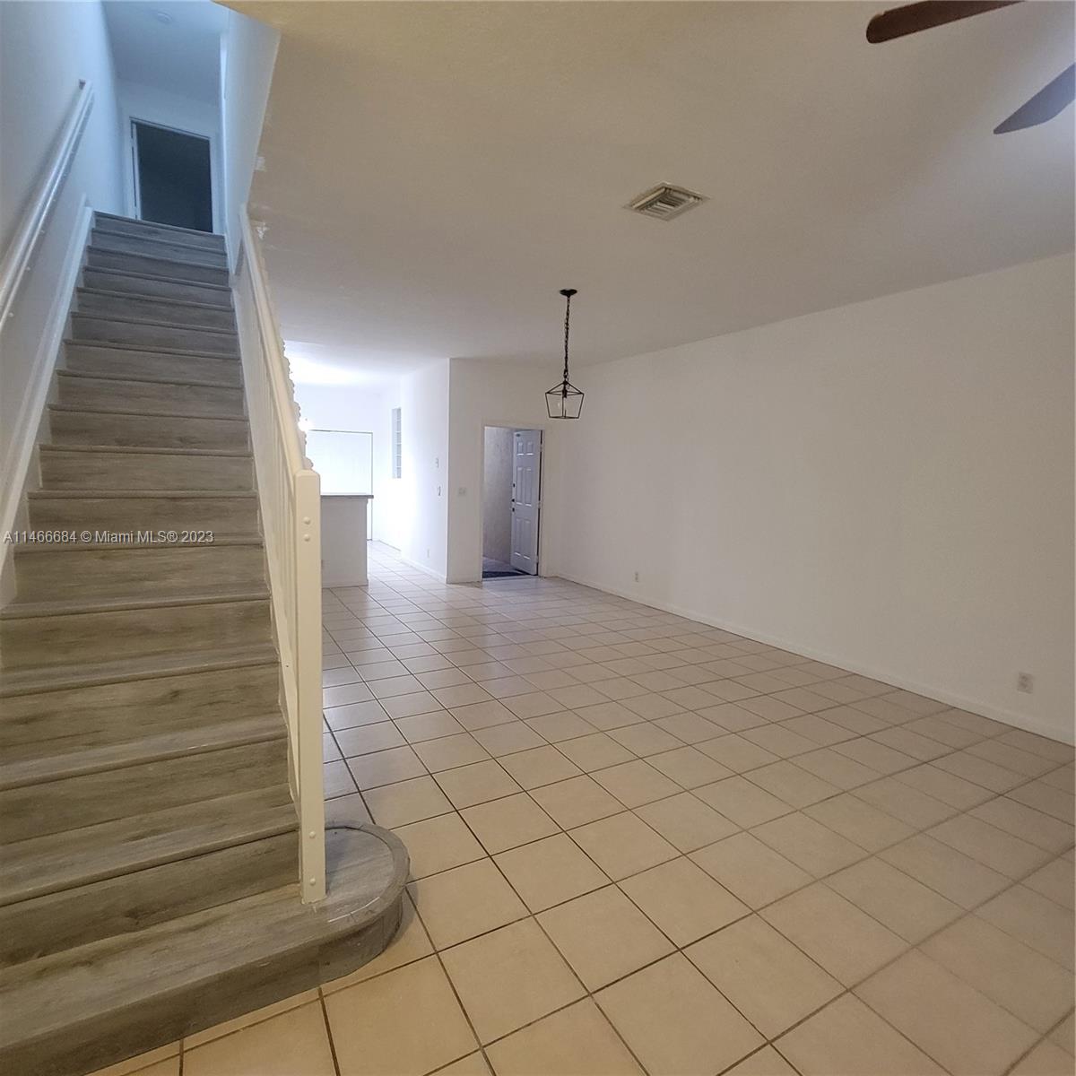 3883 Tree Top Drive Weston, FL 33332 - Photo 7 of 22 a view of entryway and hall