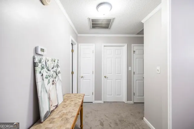 a view of front door with a sink