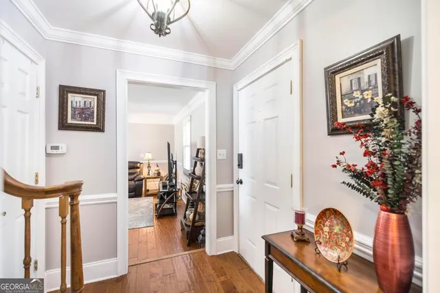 a view of a livingroom with furniture and a window