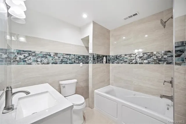 a view of hallway with wooden floor