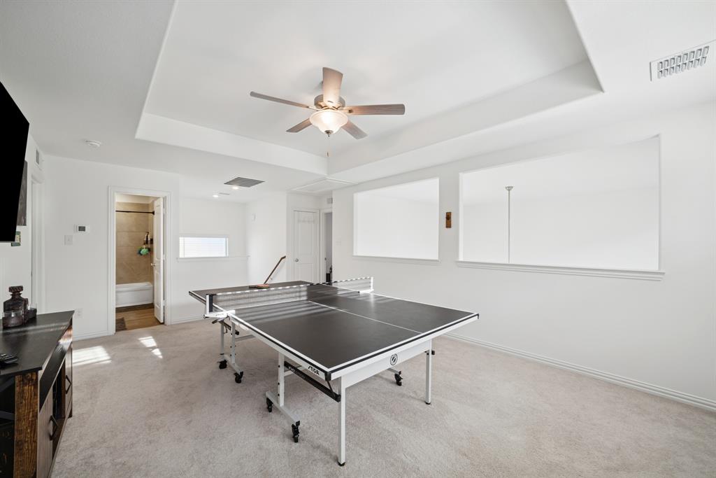 10040 Thornapple Road Fort Worth, TX 76179 - Photo 16 of 24 a room with pool table and windows