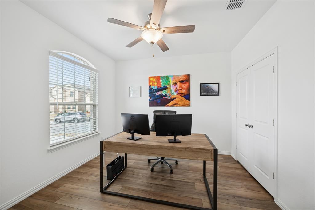10040 Thornapple Road Fort Worth, TX 76179 - Photo 6 of 24 a view of a workspace with furniture and a window