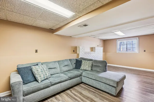 a living room with furniture and a couch
