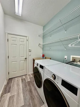 a view of an empty room with glass door