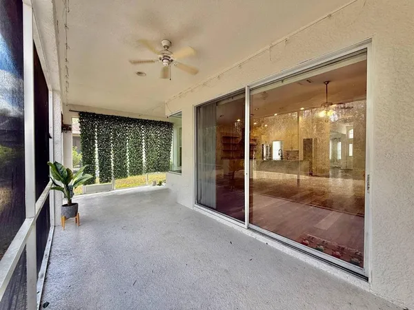 a view of a room with a large window