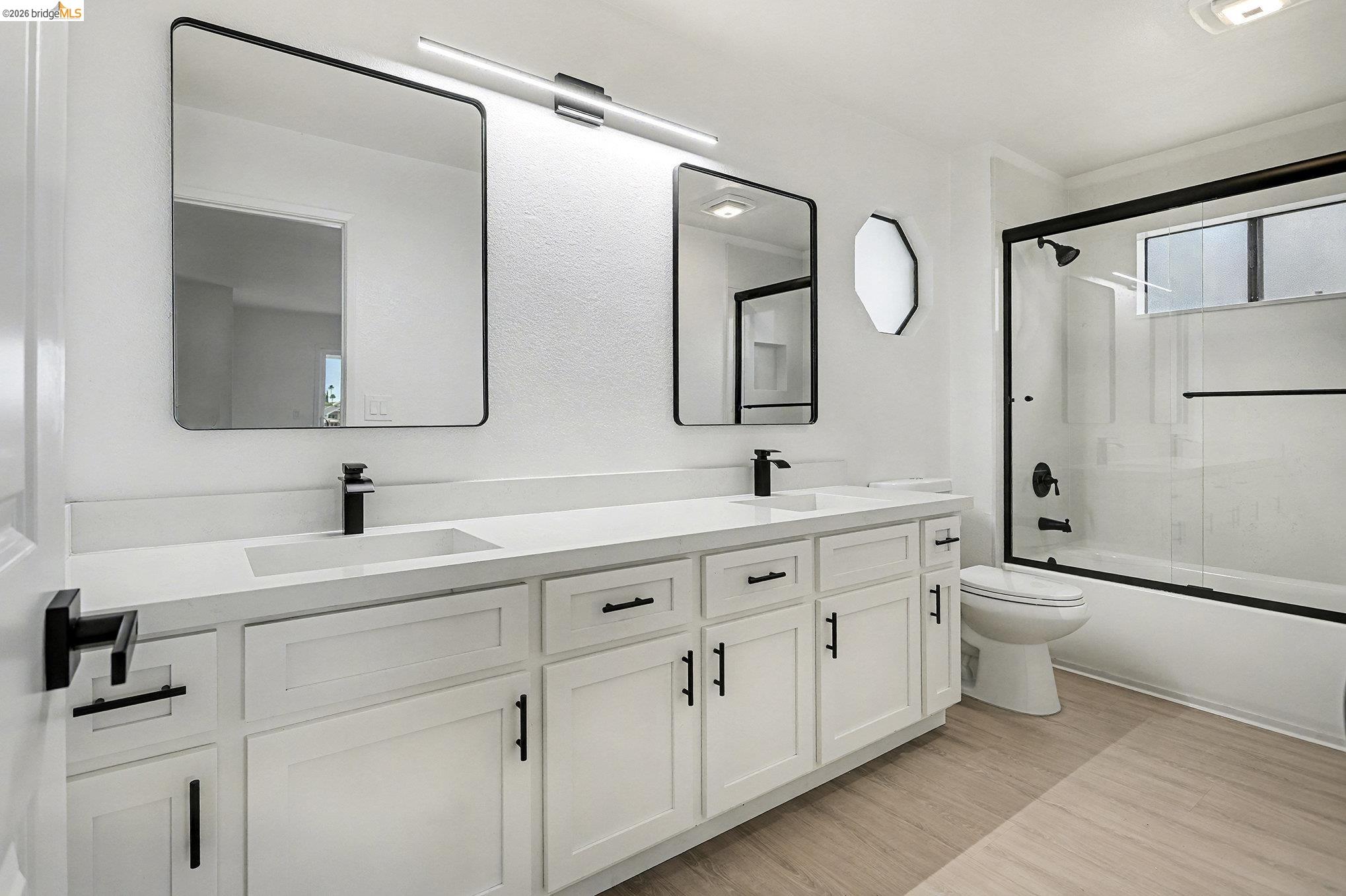 4741 Discovery Point Discovery Bay, CA 94505 - Photo 24 of 52 a bathroom with a double vanity sink mirror and toilet