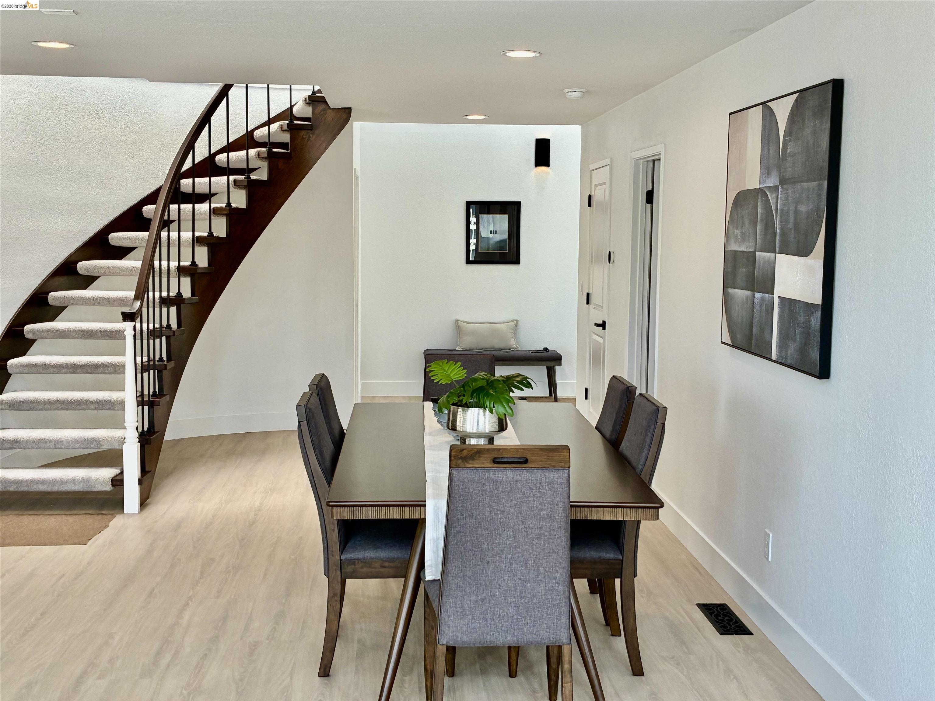 4741 Discovery Point Discovery Bay, CA 94505 - Photo 9 of 52 a view of a dining room with furniture and wooden floor