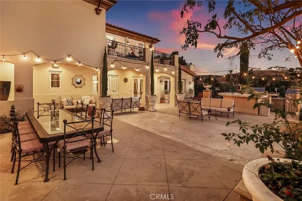 a view of a chairs and tables in the patio