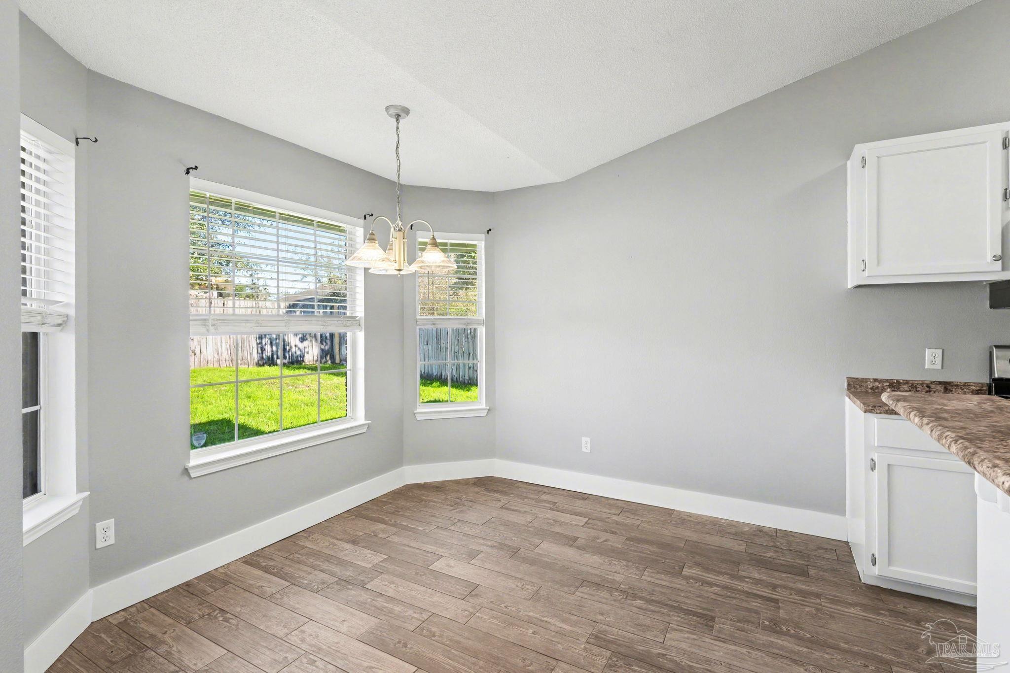 1648 Condor Drive Cantonment, FL 32533 - Photo 24 of 51 a view of an empty room with a window