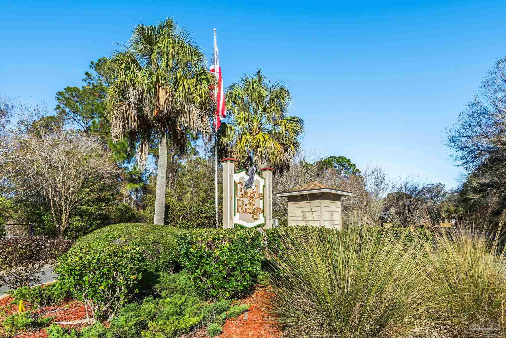 1648 Condor Drive Cantonment, FL 32533 - Photo 50 of 51 a plant is in front of a yard