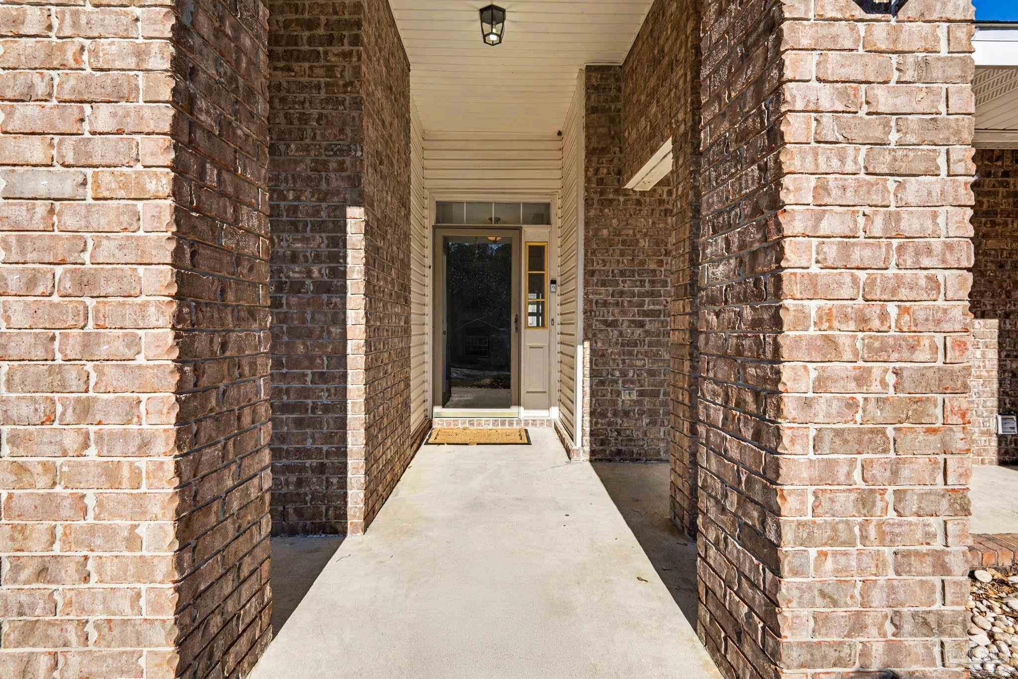 1648 Condor Drive Cantonment, FL 32533 - Photo 10 of 51 a view of a brick buildings