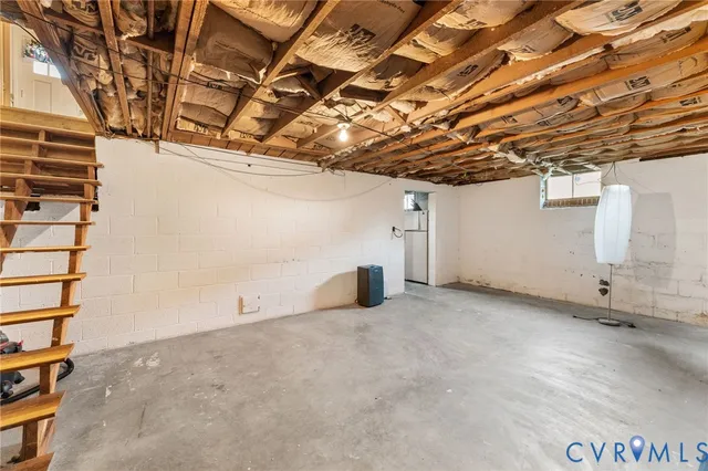 a view of empty room with windows