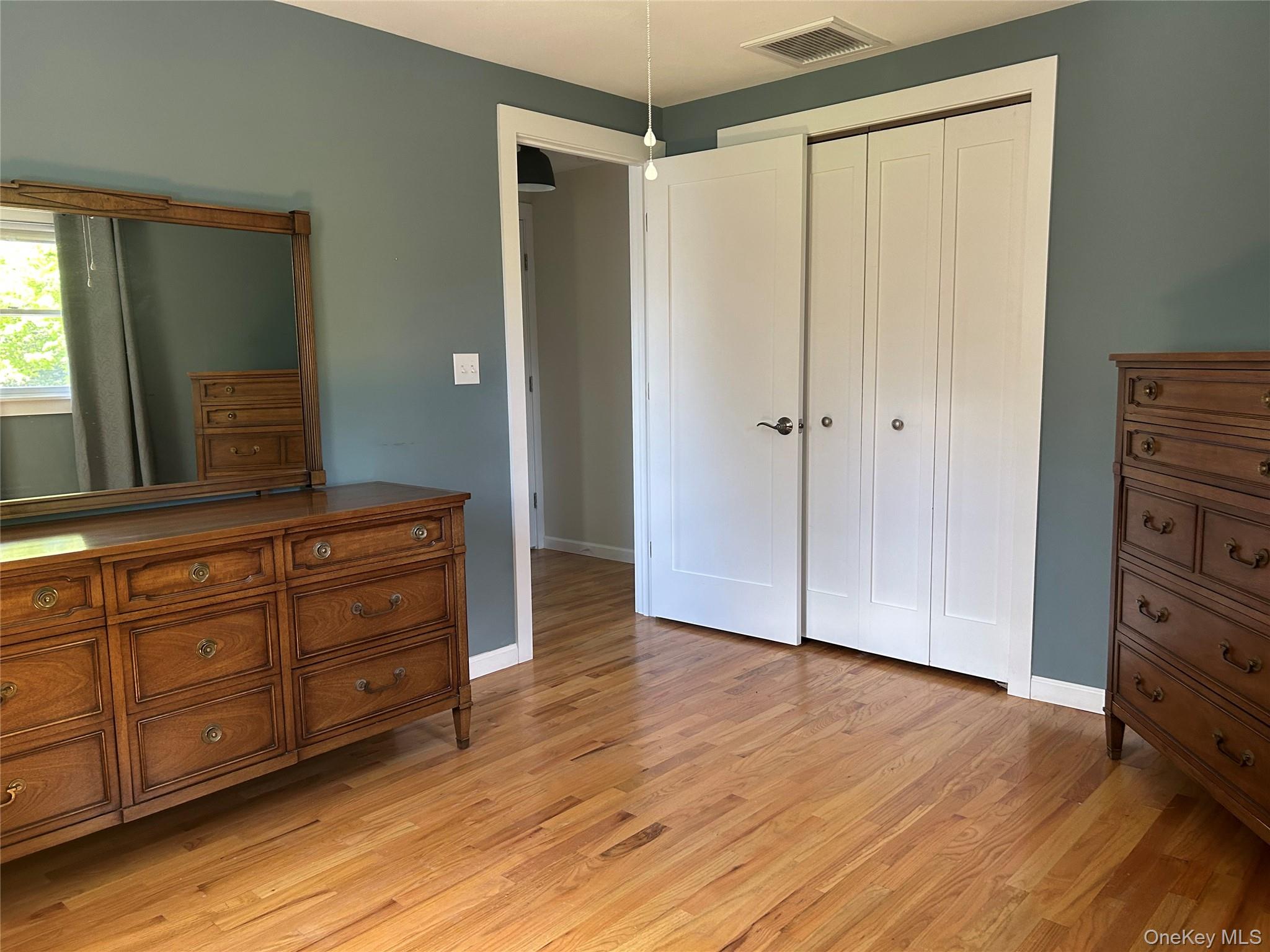 58 Wheaton Avenue Fishkill, NY 12524 - Photo 16 of 20 a room with a dresser and a mirror
