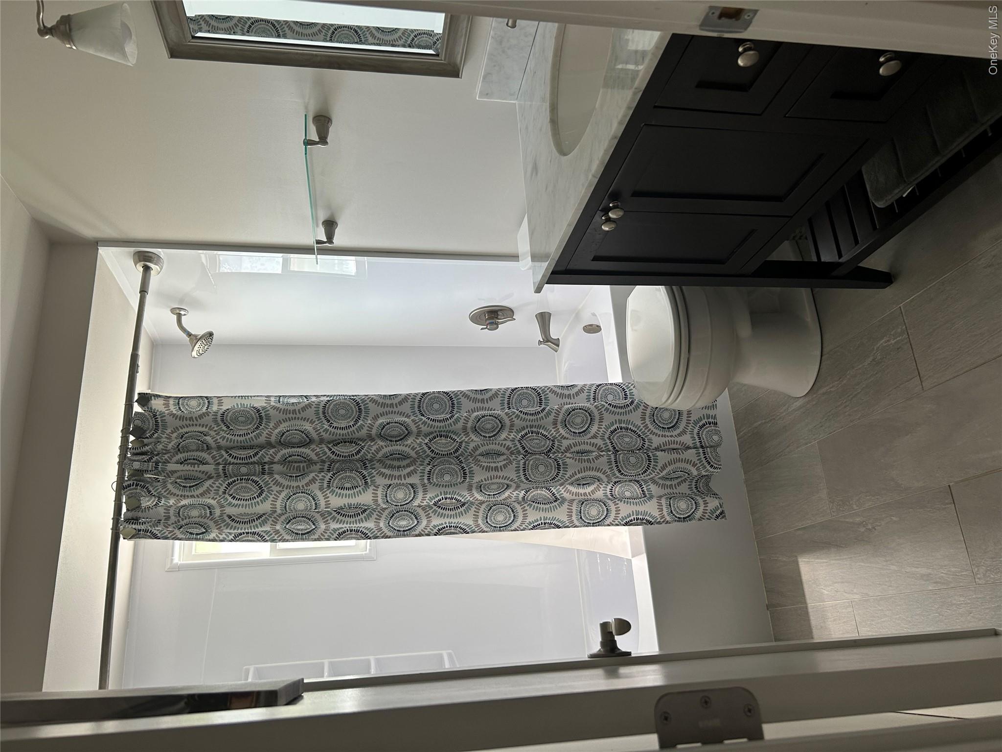 58 Wheaton Avenue Fishkill, NY 12524 - Photo 18 of 20 a bathroom with a granite countertop sink toilet and shower