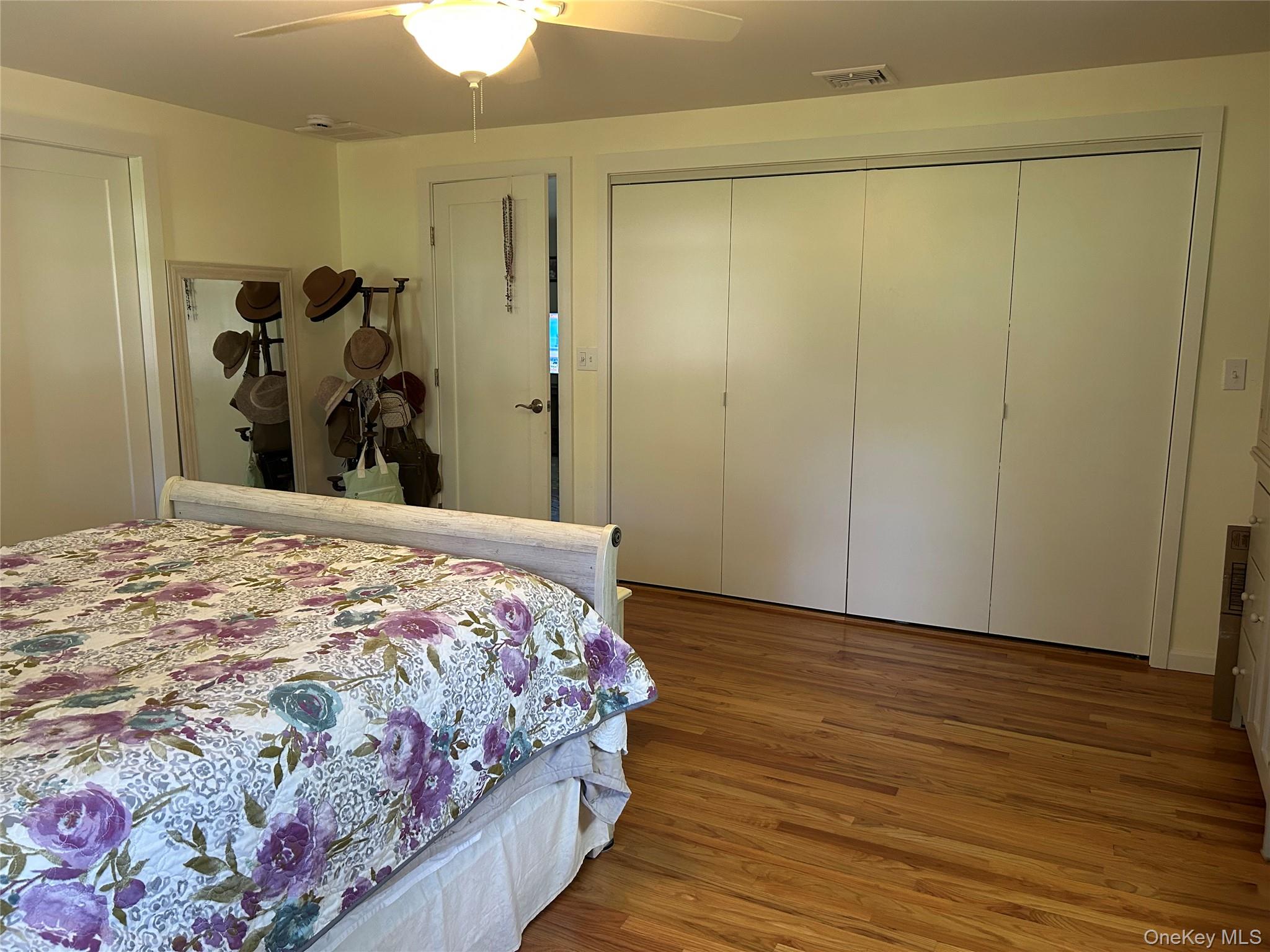 58 Wheaton Avenue Fishkill, NY 12524 - Photo 9 of 20 a bedroom with a bed and a mirror