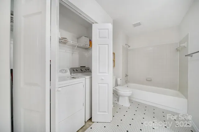 a bathroom with a sink a mirror and a shower