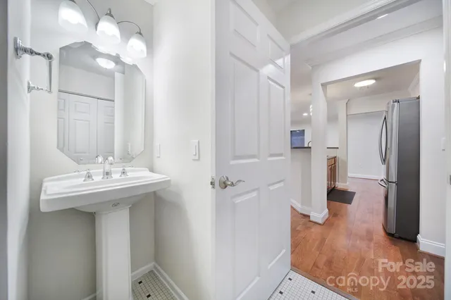 a view of a room with wooden floor and balcony