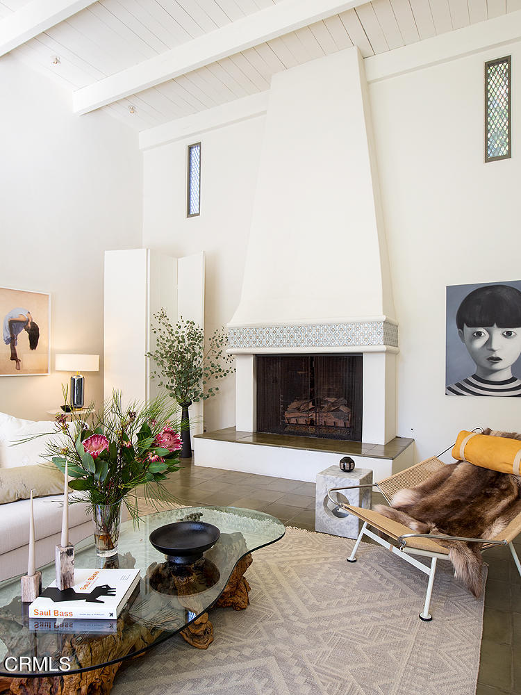 490 La Loma Road Pasadena, CA 91105 - Photo 11 of 59 a living room with furniture and flowers