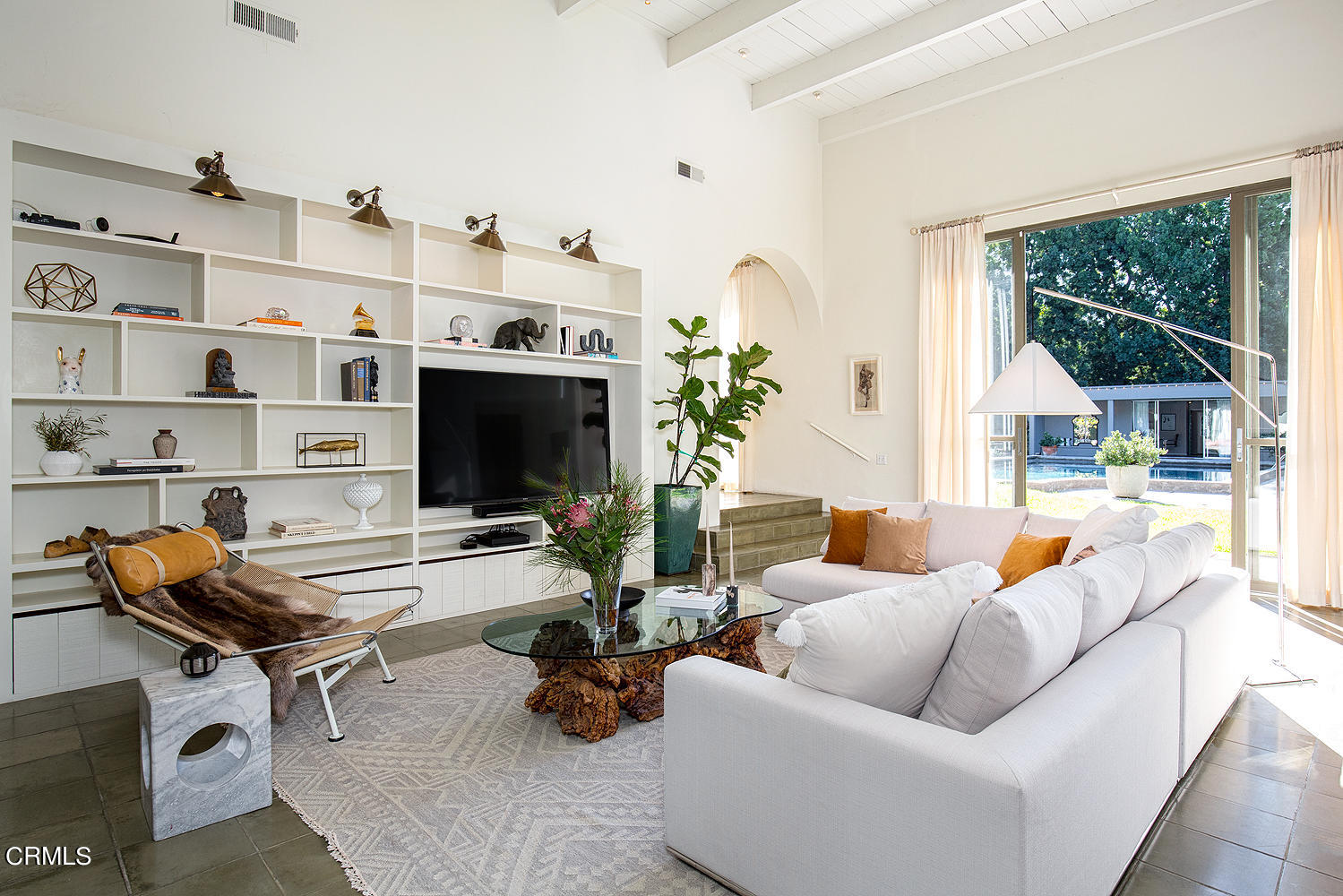490 La Loma Road Pasadena, CA 91105 - Photo 13 of 59 a living room with furniture a flat screen tv and a floor to ceiling window