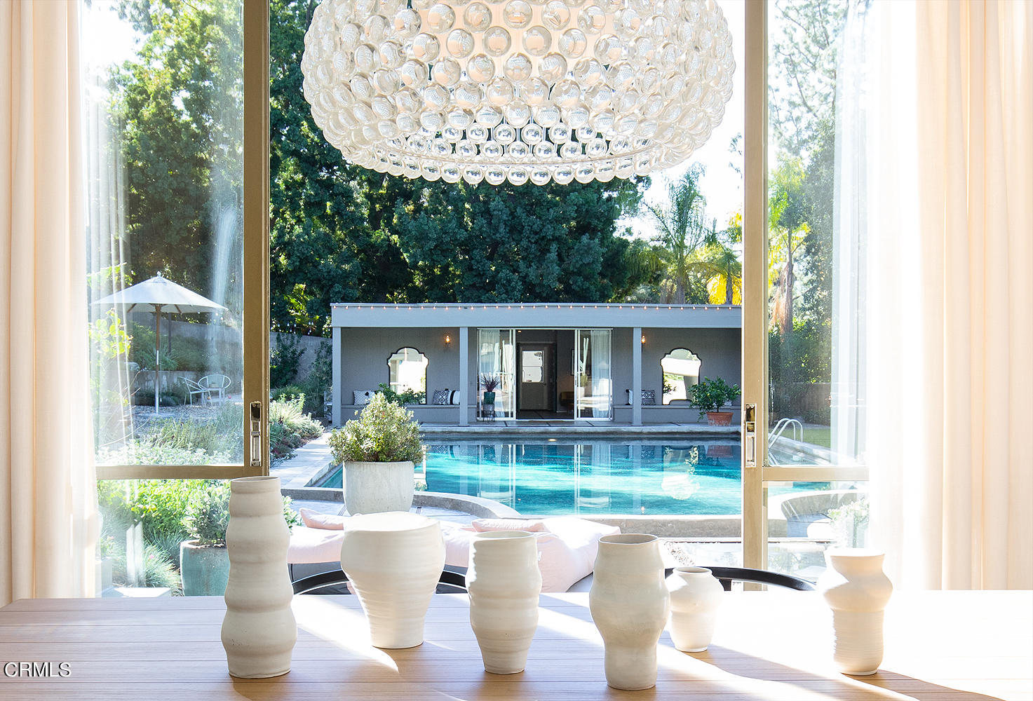 490 La Loma Road Pasadena, CA 91105 - Photo 17 of 59 a front view of a house with swimming pool having outdoor seating