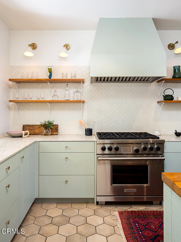 490 La Loma Road Pasadena, CA 91105 - Photo 22 of 59 a white stove top oven sitting inside of a kitchen