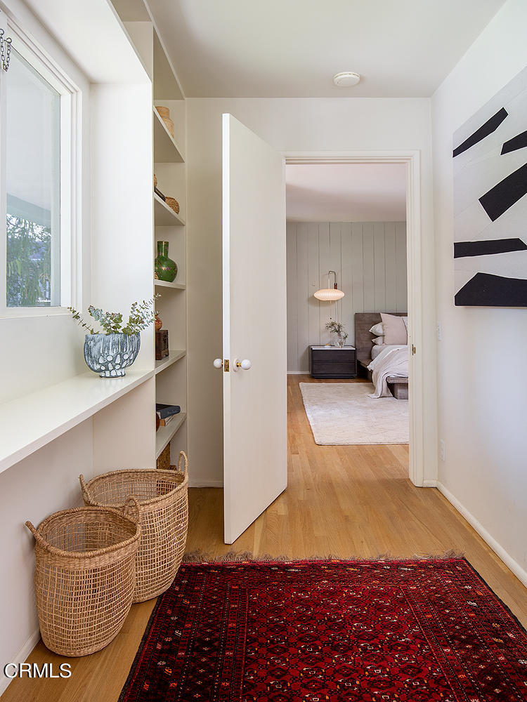490 La Loma Road Pasadena, CA 91105 - Photo 29 of 59 a bedroom with furniture and a potted plant