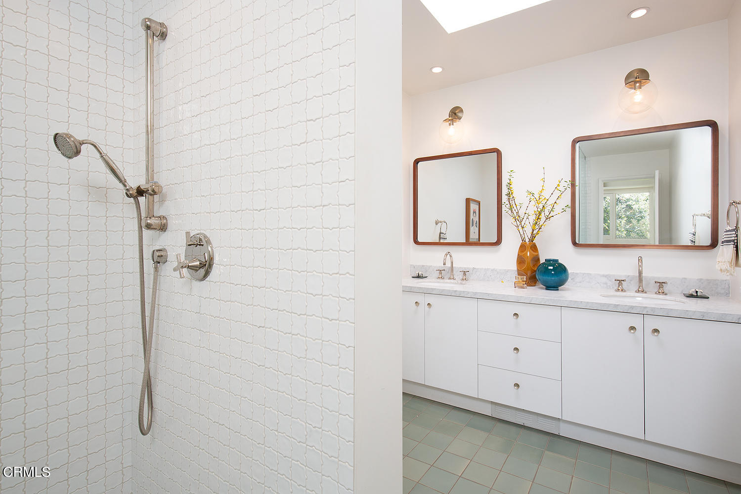 490 La Loma Road Pasadena, CA 91105 - Photo 34 of 59 a bathroom with a double vanity sink and a mirror