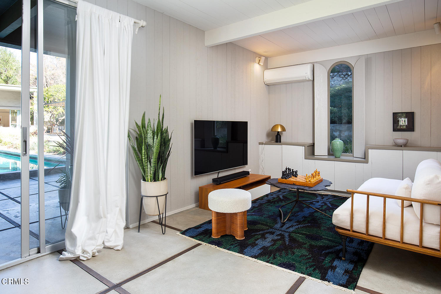 490 La Loma Road Pasadena, CA 91105 - Photo 41 of 59 a living room with furniture and a flat screen tv