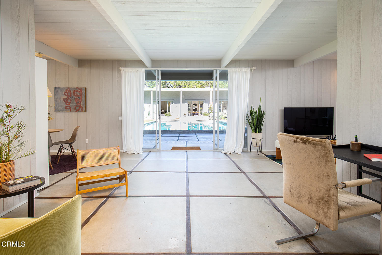 490 La Loma Road Pasadena, CA 91105 - Photo 45 of 59 a living room with furniture a flat screen tv and a floor to ceiling window